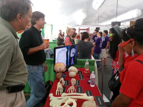 Kathy Schick, Tom Schoenemann, and Jackson Njau presenting at Celebrate Science Indiana 2013