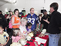 Jackson Njau and Tom Schoenemann at a science outreach event