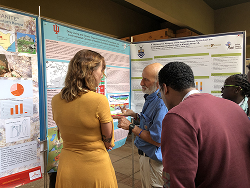 Danielle Peltier presenting a poster exhibit